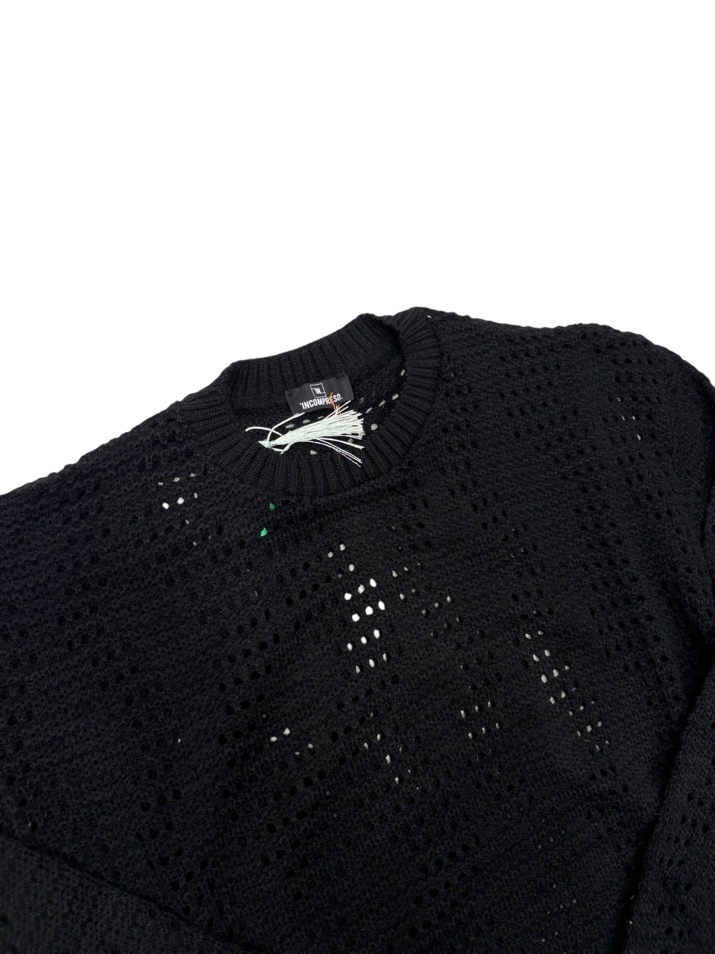 Maglione traforato incompreso