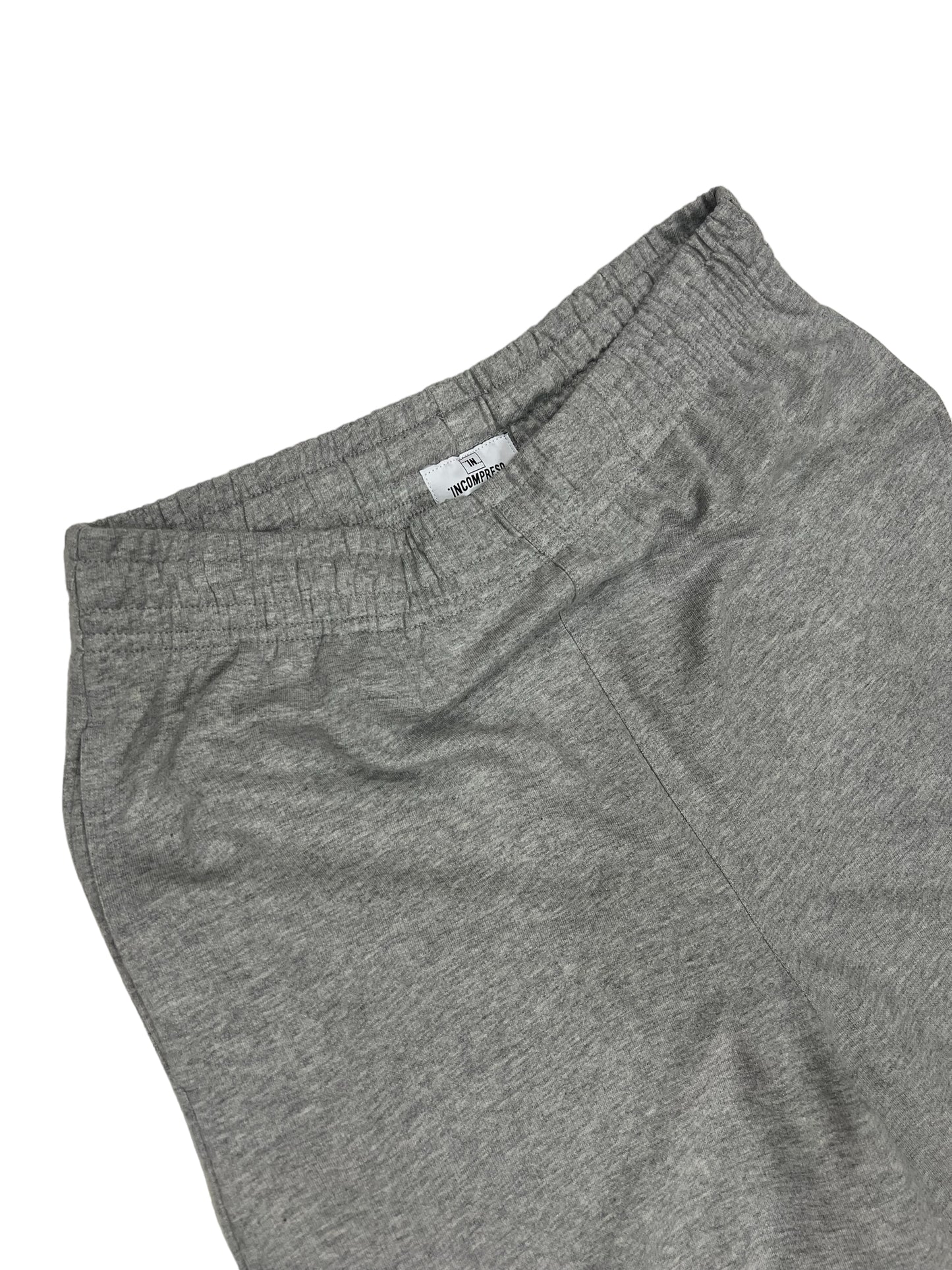 Pantalone in tuta over Incompreso